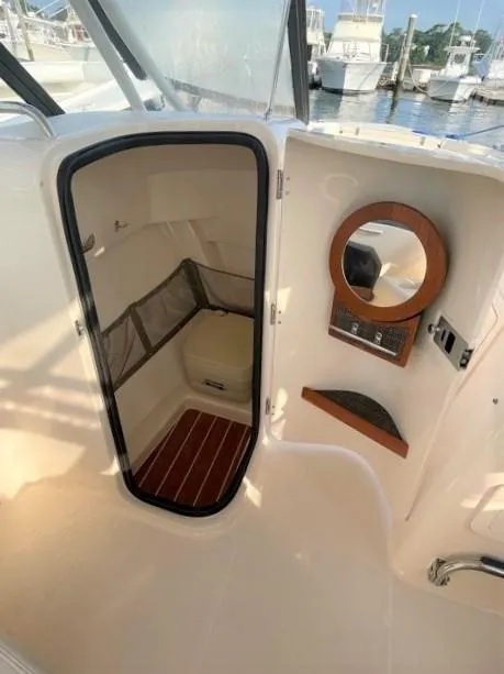 Slide: The Image of Interior of a 2016 Grady-White Freedom 255 yacht with cabin. - 7