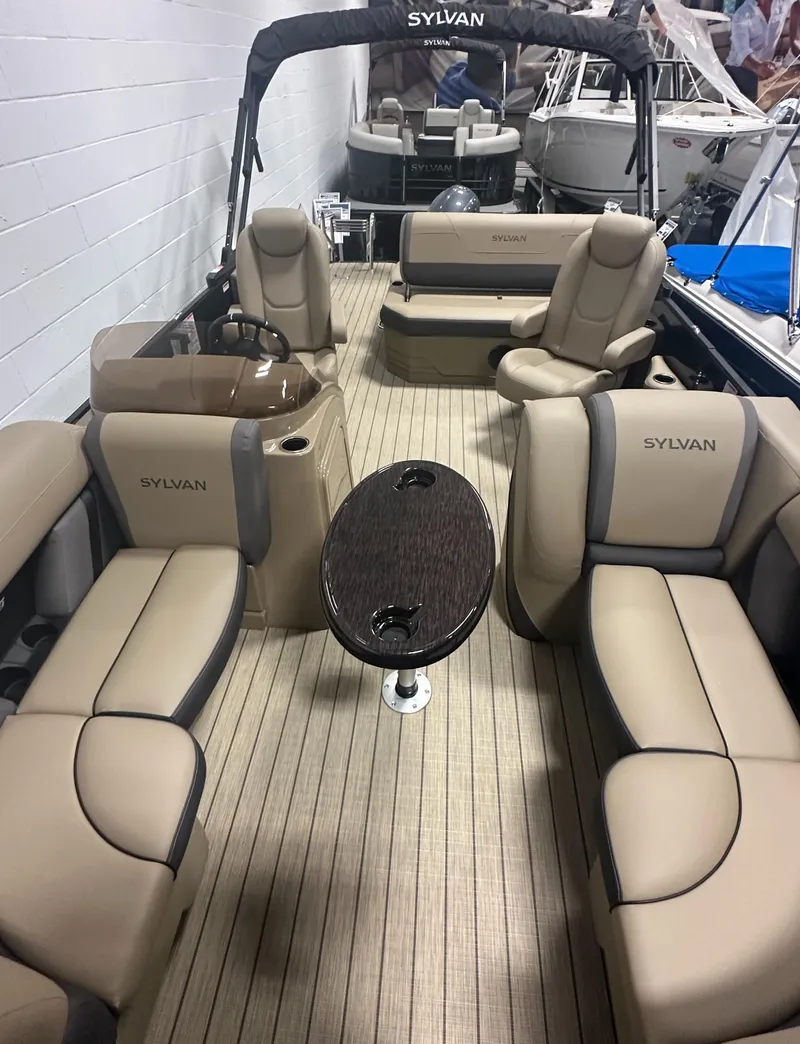 Slide: The Image of 2025 Sylvan MIRAGE X1 CLZ DH pontoon boat with spacious seating and modern design. - 20