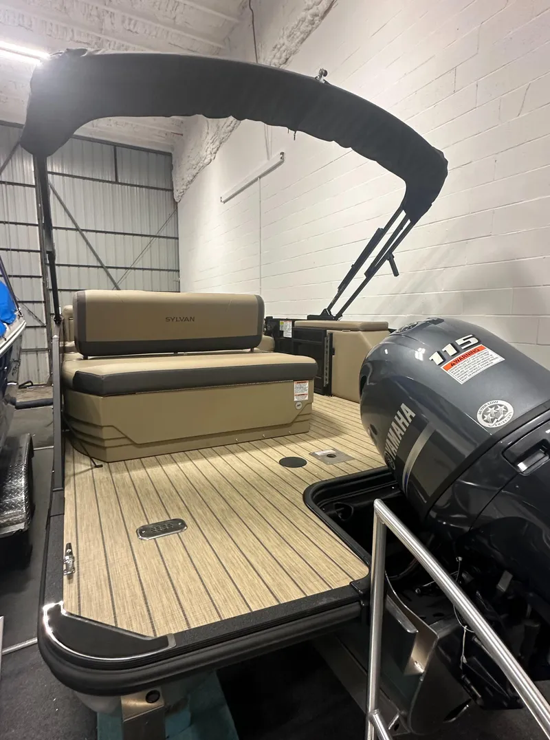 Slide: The Image of 2025 Sylvan MIRAGE X1 CLZ DH boat with Yamaha 115 engine in showroom. - 4
