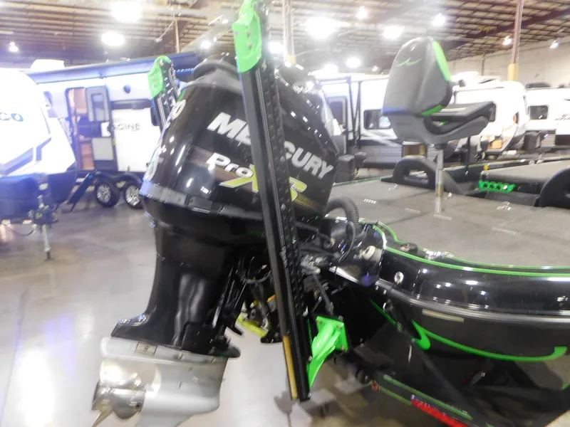 Slide: The Image of 2016 Legend Boats V20 VC with Mercury Pro XS engine in showroom. - 16