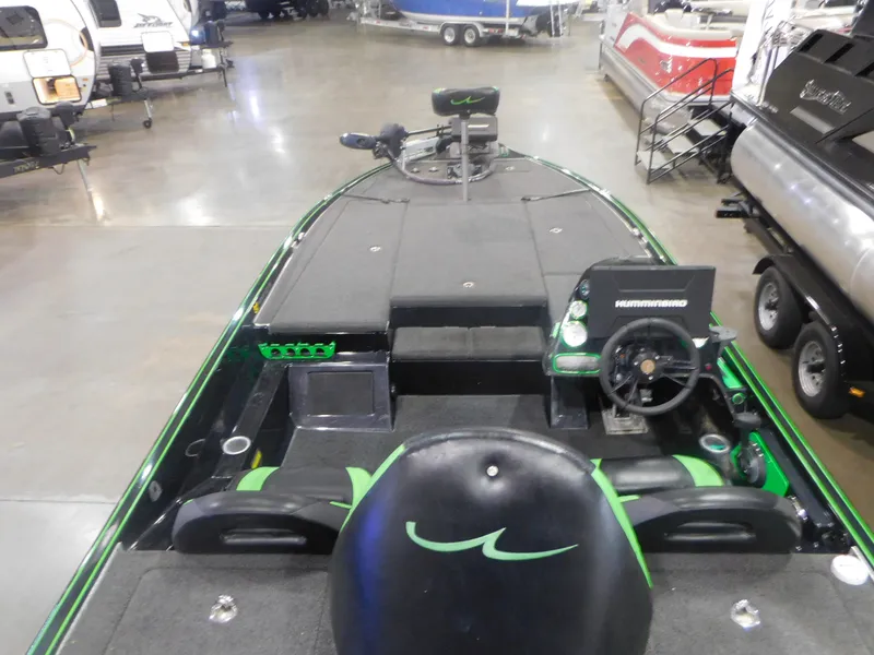 Slide: The Image of 2016 Legend Boats V20 VC fishing boat interior with steering console and seating. - 5