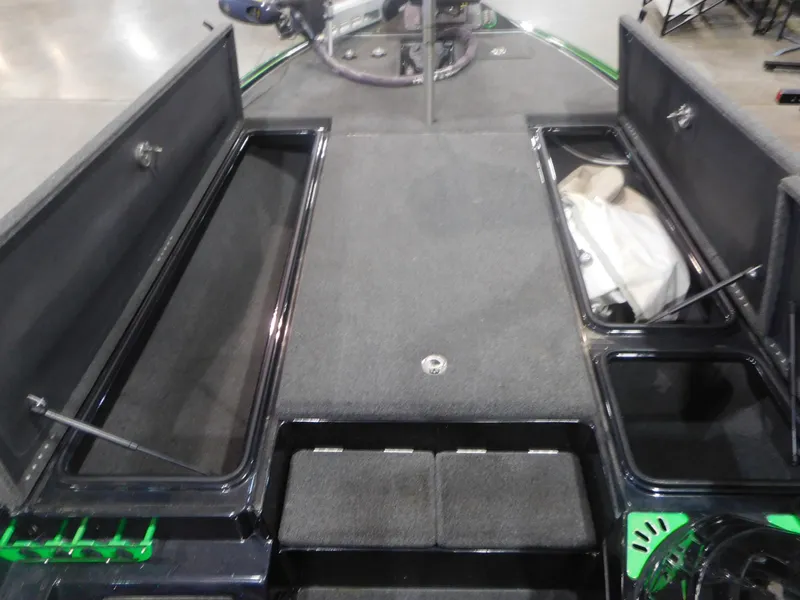 Slide: The Image of 2016 Legend Boats V20 VC interior with open storage compartments. - 8