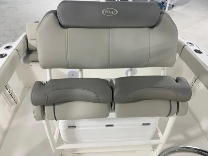 Slide: The Image of 2024 Key West 219 FS boat seating with cushioned backrest and armrests. - 8