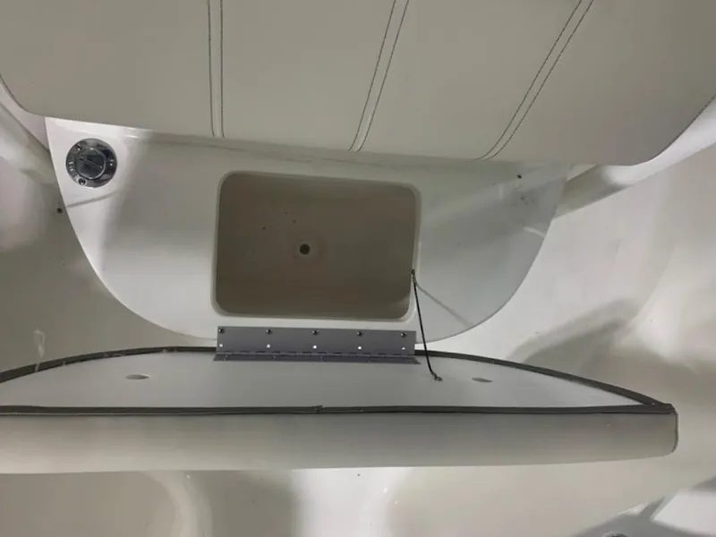 Slide: The Image of 2024 Key West 219 FS boat interior storage compartment. - 9