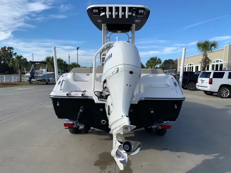 Slide: The Image of 2024 Key West 219 FS boat with Yamaha outboard motor, rear view. - 2