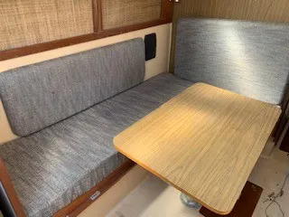 Slide: The Image of Interior seating and table of a 1970 Pearson 35 Sloop sailboat. - 12