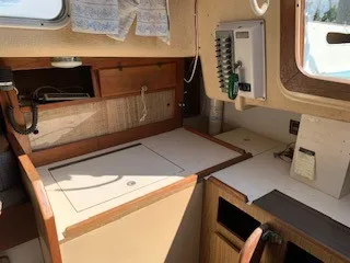 Slide: The Image of 1970 Pearson 35 Sloop interior with navigation station and electrical panel. - 14