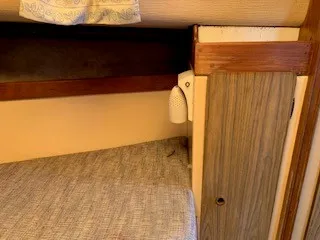 Slide: The Image of Interior cabin of a 1970 Pearson 35 Sloop sailboat with wooden trim. - 22