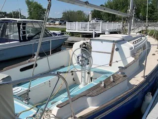 Slide: The Image of 1970 Pearson 35 Sloop sailboat docked at marina. - 3