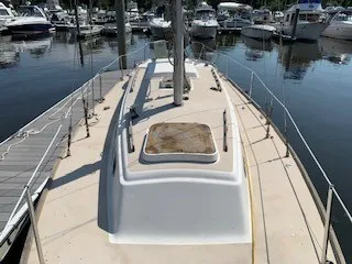 Slide: The Image of 1970 Pearson 35 Sloop docked at a marina. - 7