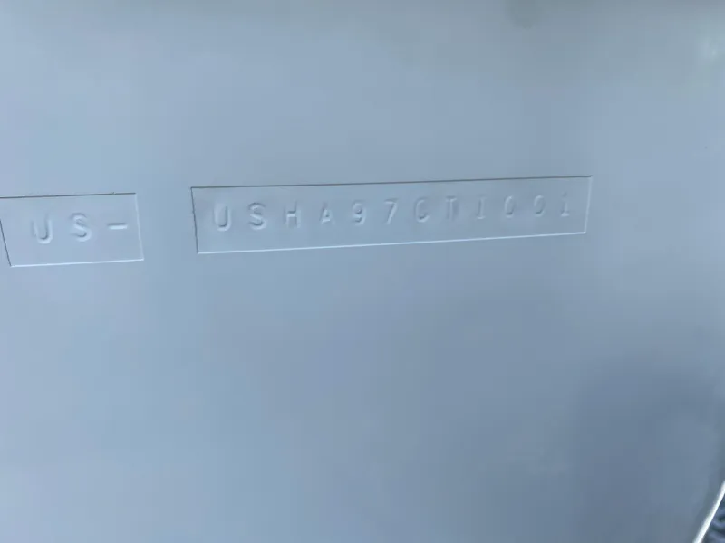 Slide: The Image of Hull identification number (HIN) on a 2001 Bayliner 215 Bowrider boat. - 19