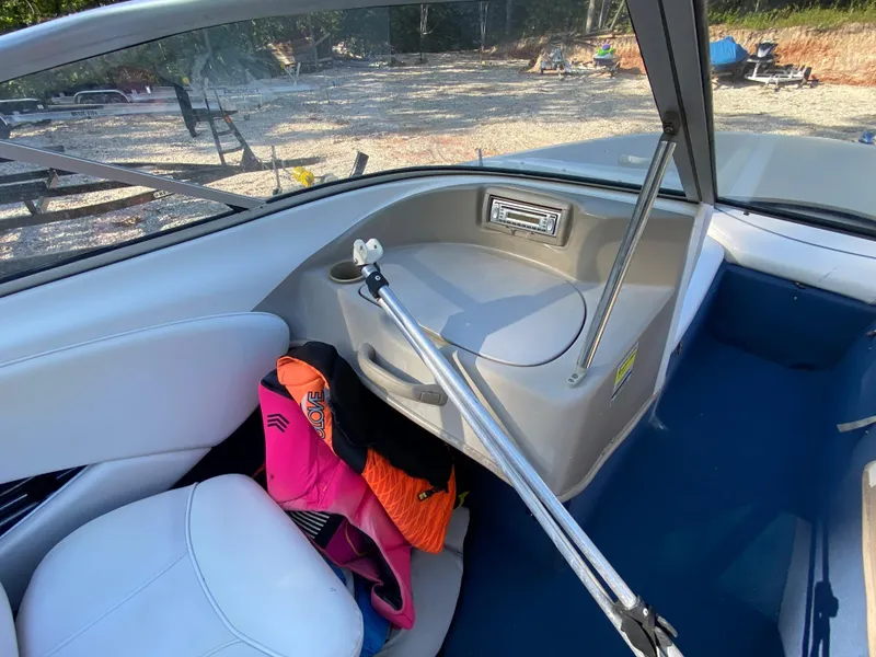 Slide: The Image of Interior of a 2001 Bayliner 215 Bowrider boat with life jackets. - 9