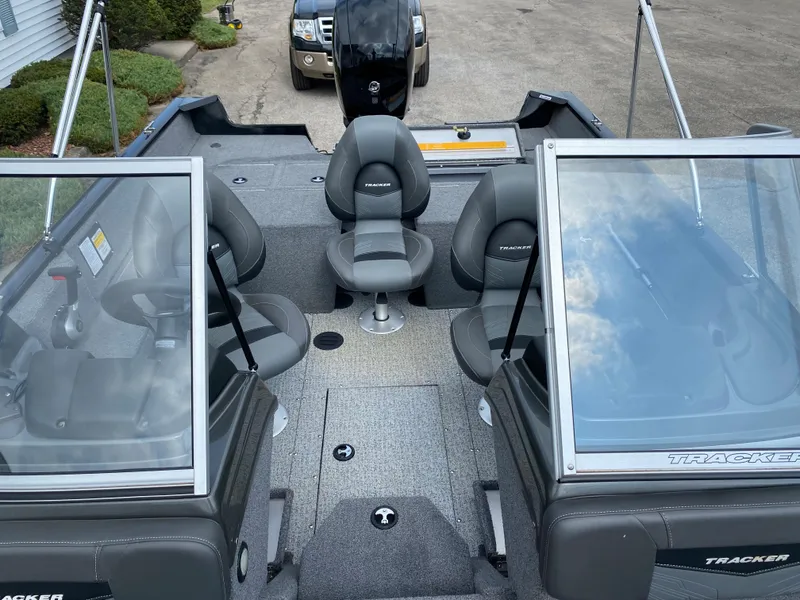 Slide: The Image of 2020 Tracker Pro Guide V175 boat interior with seating and windshield. - 5
