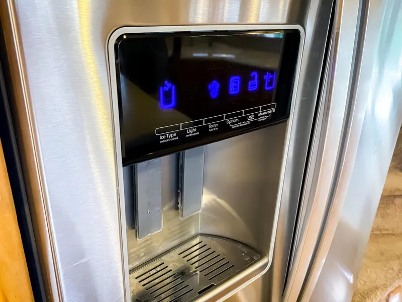 Slide: The Image of Stainless steel refrigerator with digital ice and water dispenser, Navigator 5800 model, 1999. - 11