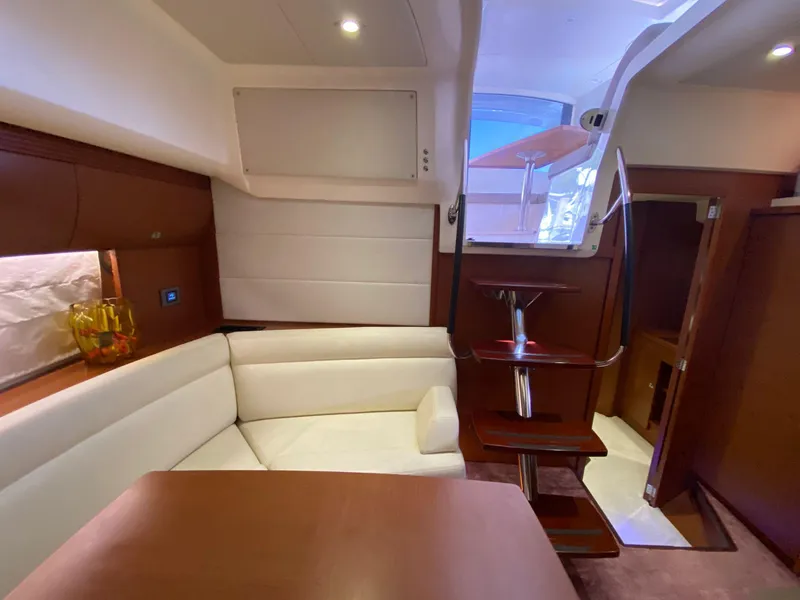 Slide: The Image of Luxurious interior of 2013 Prestige 440 S yacht with elegant seating and wooden finishes. - 12