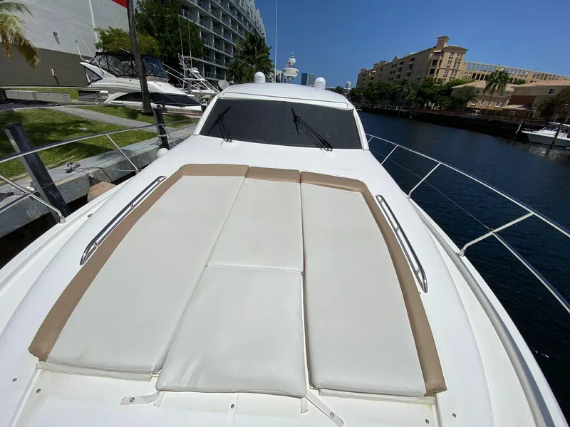 Slide: The Image of 2013 Prestige 440 S yacht with sunbathing deck, docked in a marina. - 17