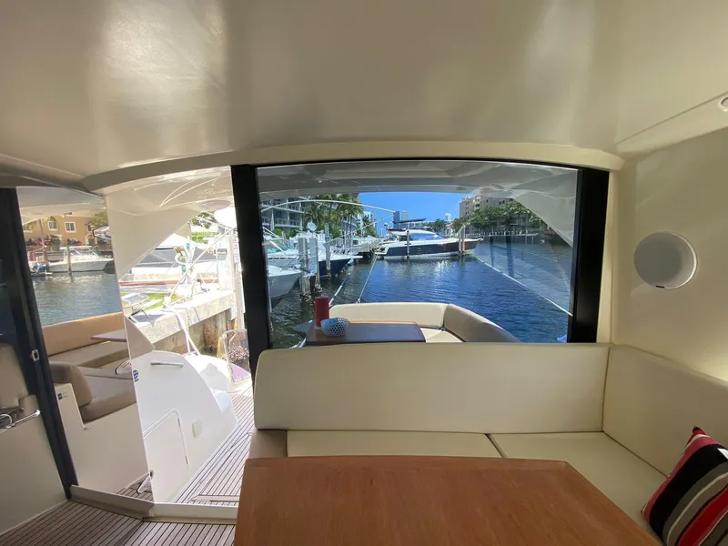 Slide: The Image of Interior view of 2013 Prestige 440 S yacht with marina backdrop. - 19