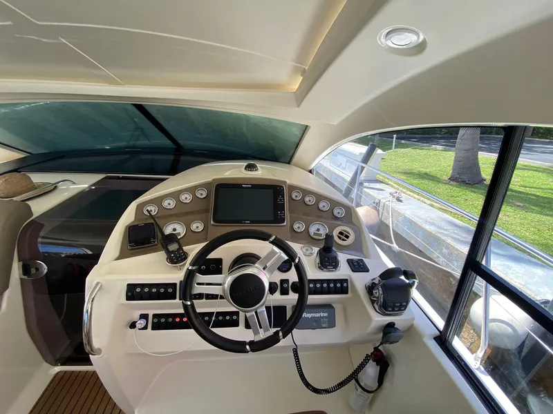 Slide: The Image of Prestige 440 S 2013 yacht helm with modern controls and navigation system. - 21