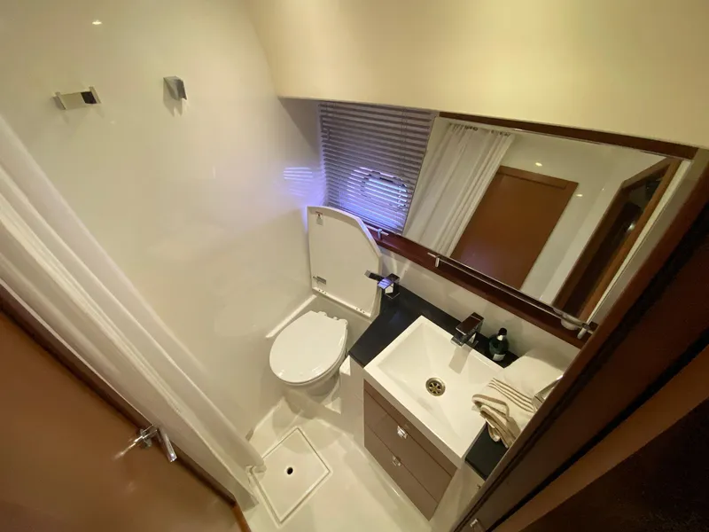 Slide: The Image of Luxurious bathroom in 2013 Prestige 440 S yacht with modern fixtures and sleek design. - 22