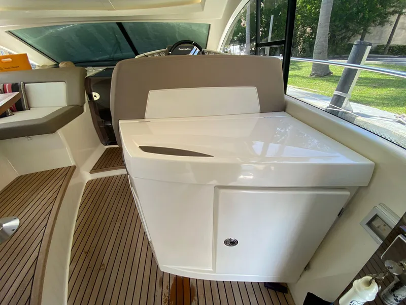 Slide: The Image of Interior of 2013 Prestige 440 S yacht with sleek cabinetry and wood flooring. - 23