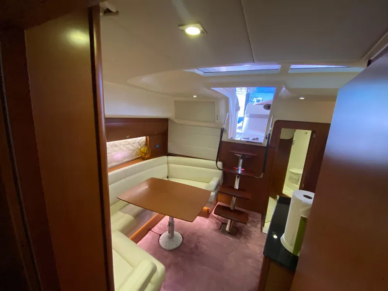 Slide: The Image of Luxurious interior of 2013 Prestige 440 S yacht with elegant seating and dining area. - 27