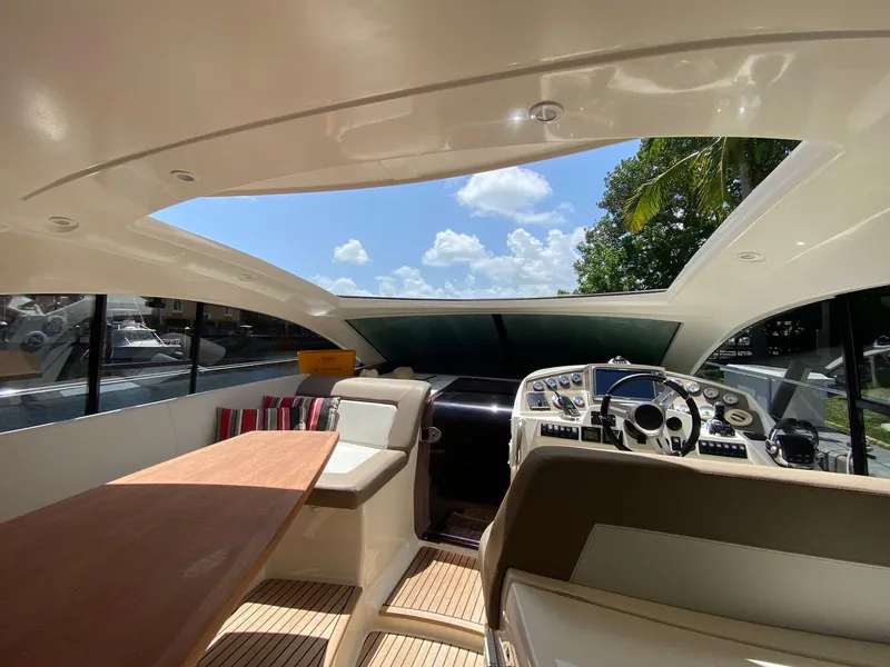 Slide: The Image of Interior of 2013 Prestige 440 S yacht with modern helm and seating area. - 28