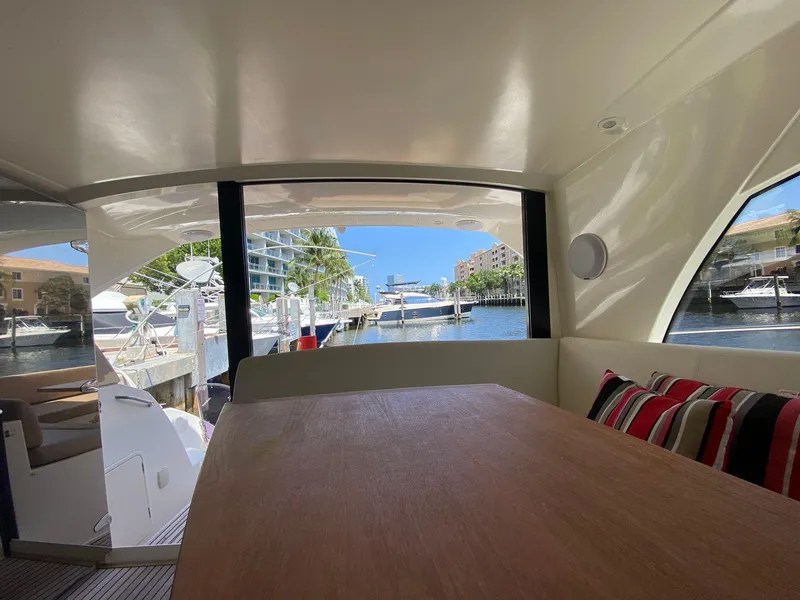 Slide: The Image of Interior view of 2013 Prestige 440 S yacht with marina backdrop. - 29