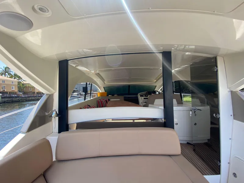 Slide: The Image of 2013 Prestige 440 S yacht interior with beige seating and modern design. - 32