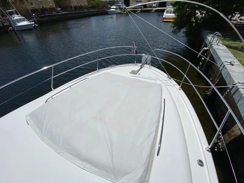 Slide: The Image of Prestige 440 S 2013 yacht bow view at marina dock. - 34