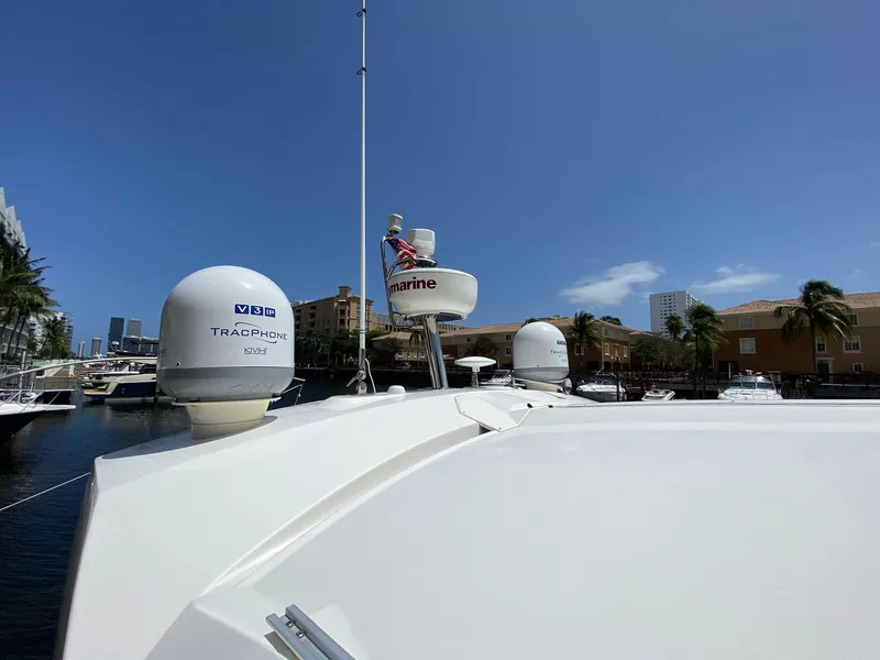 Slide: The Image of Prestige 440 S yacht, 2013 model, docked in a sunny marina with clear skies. - 35