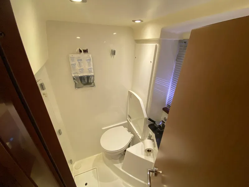 Slide: The Image of Compact bathroom in 2013 Prestige 440 S yacht with modern fixtures. - 39