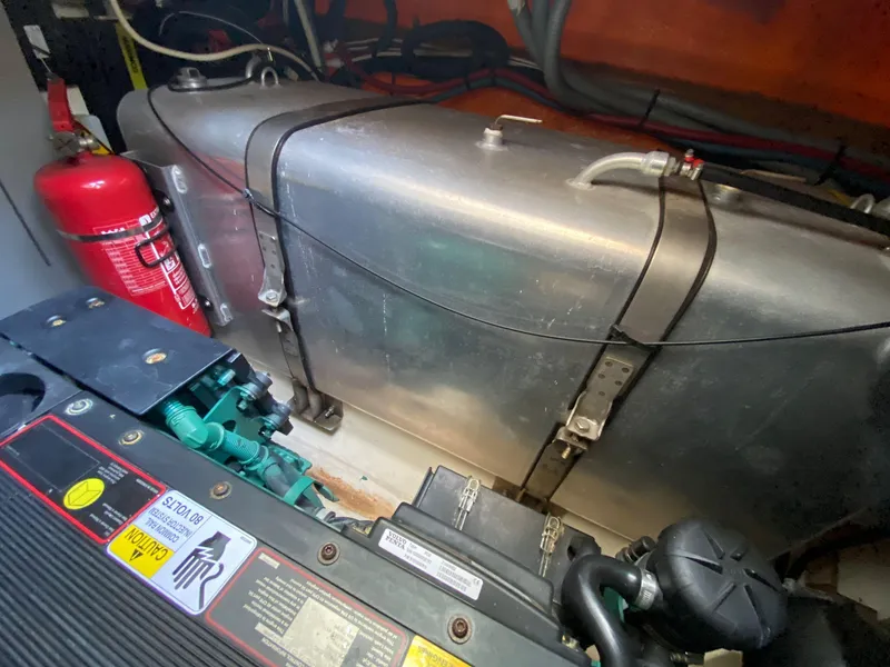 Slide: The Image of Engine compartment of a 2013 Prestige 440 S boat with visible fire extinguisher. - 45
