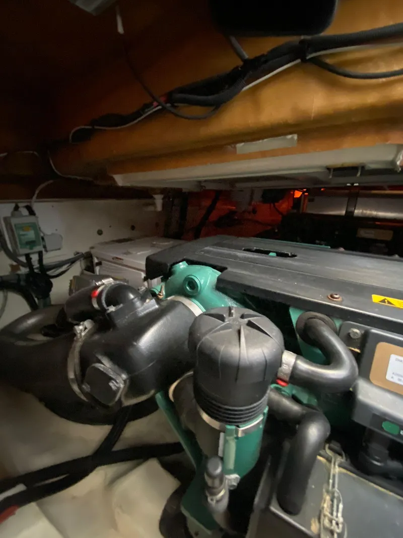 Slide: The Image of Engine room of 2013 Prestige 440 S yacht, showcasing mechanical components. - 47