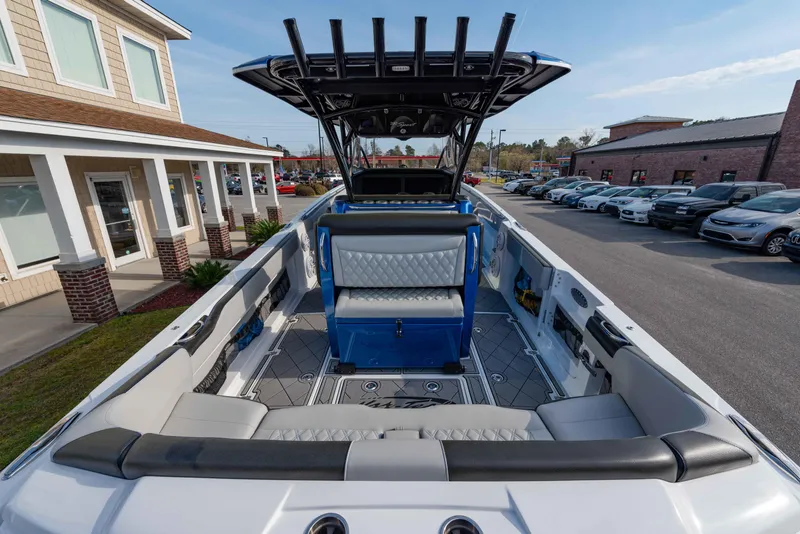 Slide: The Image of 2024 Nor-Tech 390 Center Console boat with spacious seating and modern design. - 22