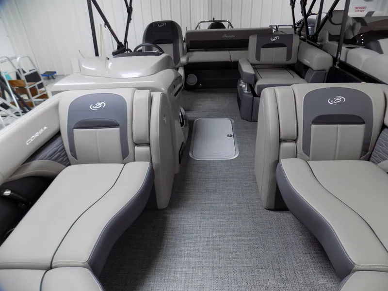 Slide: The Image of 2024 Barletta Corsa 23U pontoon boat interior with luxurious seating and modern design. - 4