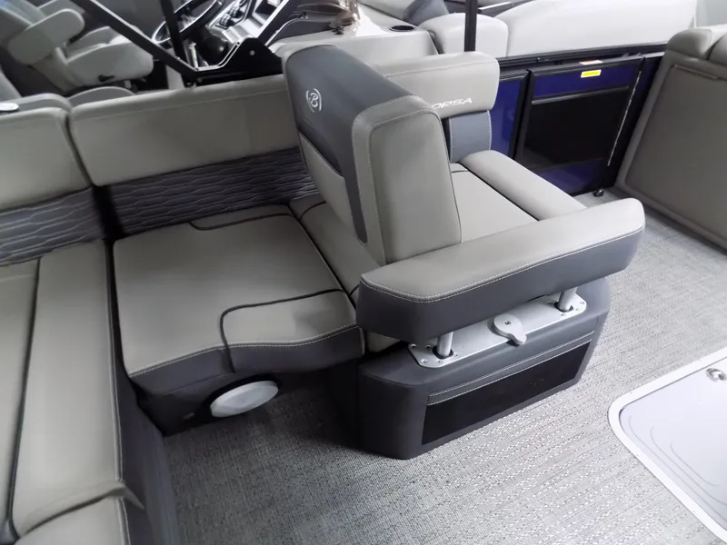 Slide: The Image of 2024 Barletta Corsa 23U boat interior with gray seating and modern design. - 6