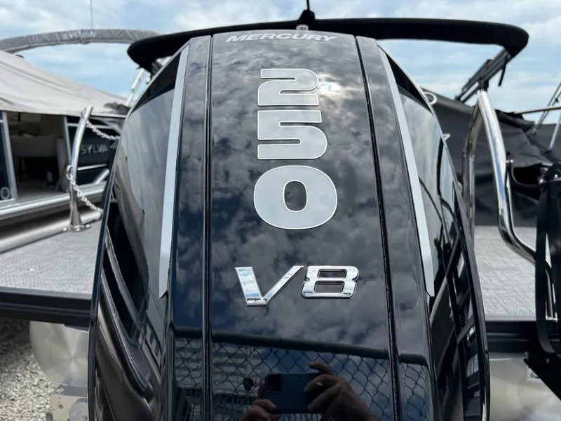 Slide: The Image of Close-up of a Mercury 250 V8 engine on a 2024 Barletta Corsa 23U boat. - 9