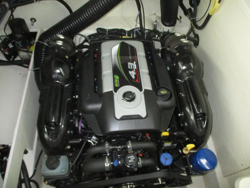 Slide: The Image of Engine compartment of a 2016 Bayliner VR6 Bowrider I/O with a clean, compact engine. - 12