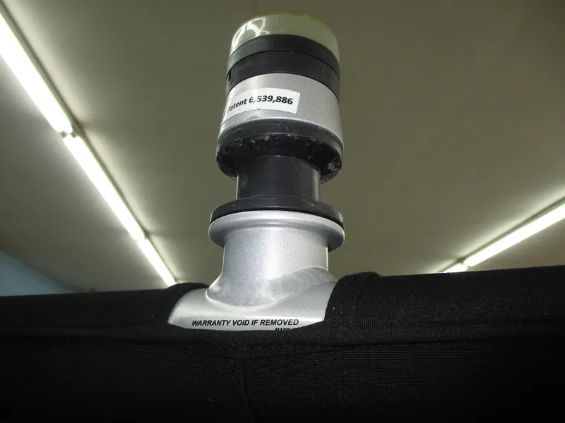 Slide: The Image of Close-up of a boat part with a warning label. - 10