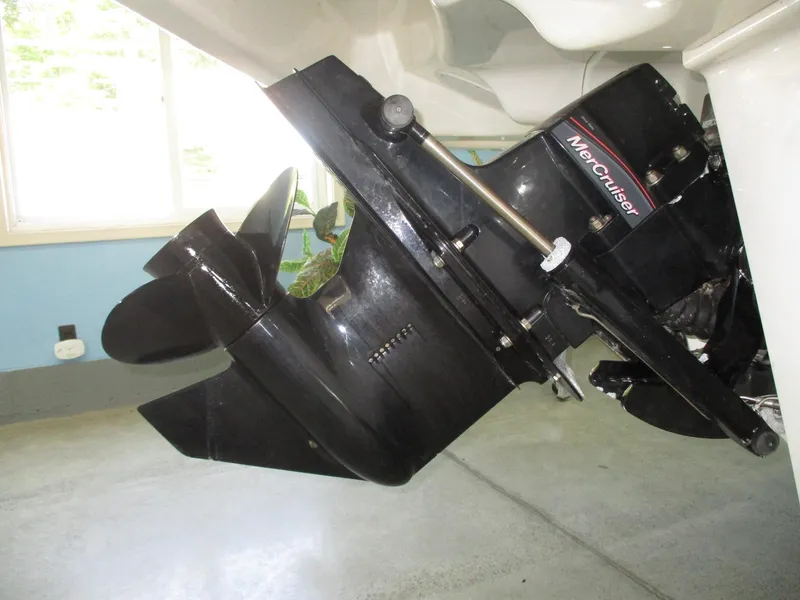 Slide: The Image of Close-up of a MerCruiser drive on a 2016 Bayliner VR6 Bowrider. - 13