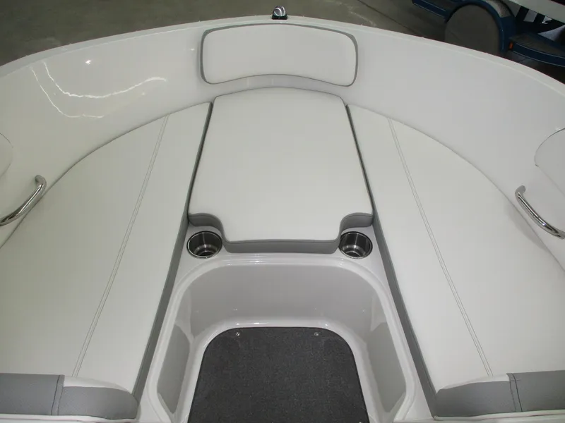 Slide: The Image of The image shows the bow area of a 2016 Bayliner VR6 Bowrider with white upholstery. - 8