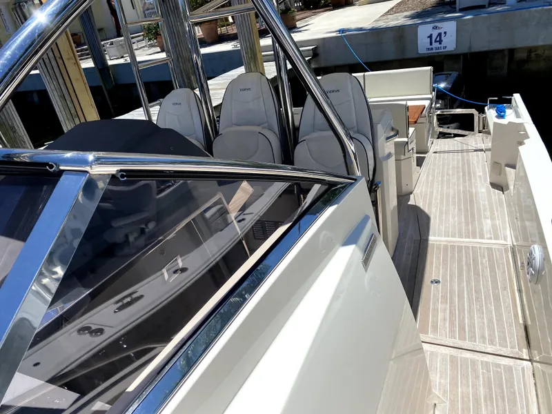 Slide: The Image of 2014 Azimut Atlantis Verve Outboard boat interior with seating and deck view. - 17