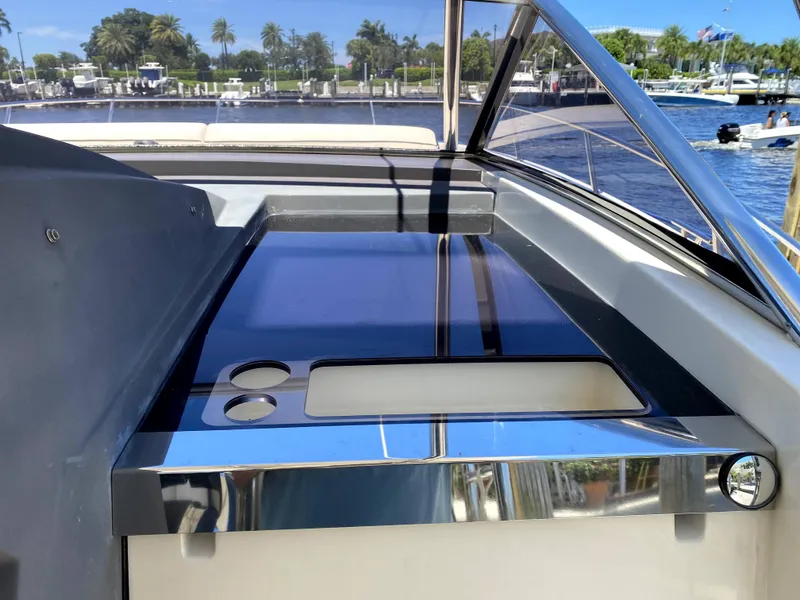 Slide: The Image of 2014 Azimut Atlantis Verve Outboard yacht deck with sleek design and waterfront view. - 28