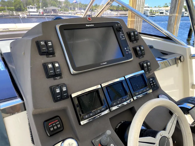 Slide: The Image of Control panel of 2014 Azimut Atlantis Verve Outboard boat with navigation system. - 29