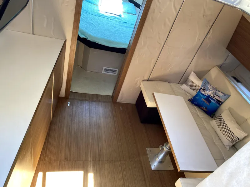 Slide: The Image of Interior of 2014 Azimut Atlantis Verve Outboard yacht with modern seating and cozy cabin. - 44
