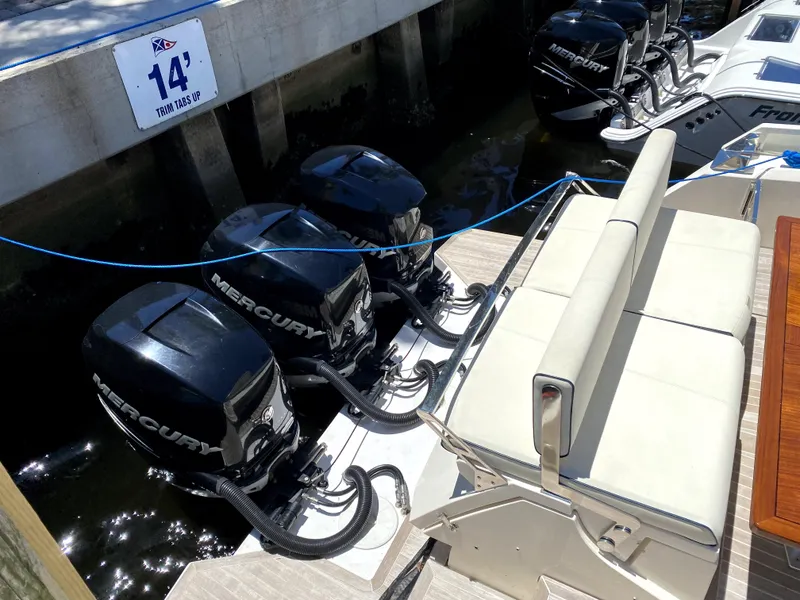Slide: The Image of Azimut Atlantis Verve Outboard 2014 with Mercury engines docked at marina. - 5