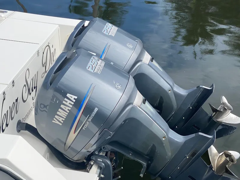 Slide: The Image of Twin Yamaha outboard engines on a 2002 Regulator 32 Forward Seating boat. - 10
