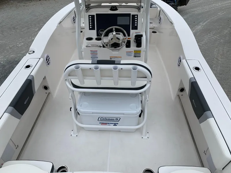 Slide: The Image of 2026 Robalo R200 Center Console boat interior with steering wheel and seating. - 15