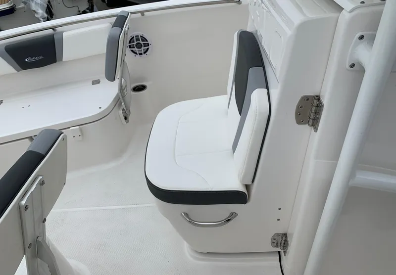 Slide: The Image of 2026 Robalo R200 Center Console boat interior with cushioned seating and sleek design. - 10