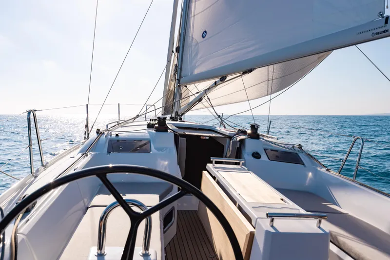 Slide: The Image of Beneteau Oceanis 34.1 sailboat, 2026 model, sailing on open sea. - 11